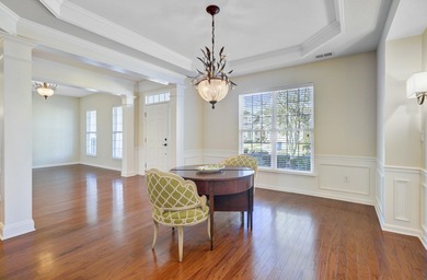 Pond living in this spacious, turn-key home in Del Webb Cane Bay