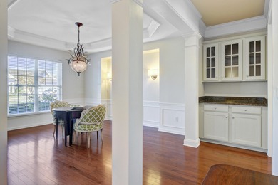 Pond living in this spacious, turn-key home in Del Webb Cane Bay