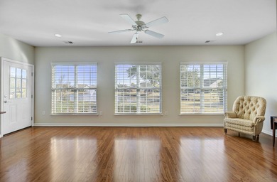 Pond living in this spacious, turn-key home in Del Webb Cane Bay