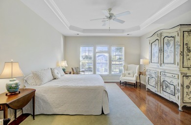 Pond living in this spacious, turn-key home in Del Webb Cane Bay