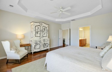 Pond living in this spacious, turn-key home in Del Webb Cane Bay