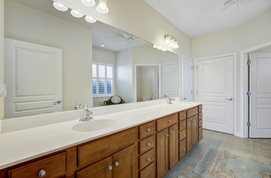 Pond living in this spacious, turn-key home in Del Webb Cane Bay