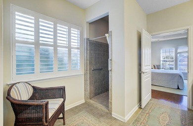 Pond living in this spacious, turn-key home in Del Webb Cane Bay