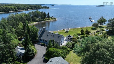 At the private, resort-style estate known as Scallop Bay - photo 1