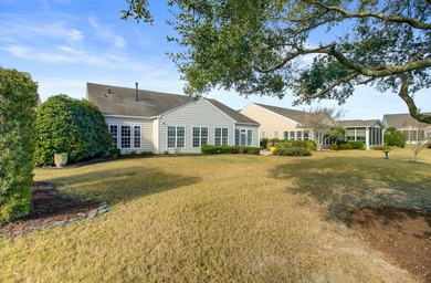 Pond living in this spacious, turn-key home in Del Webb Cane Bay