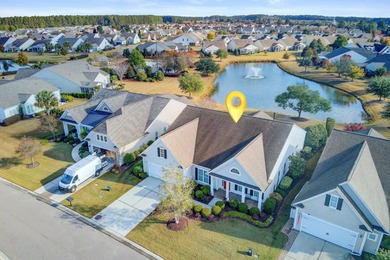 Pond living in this spacious, turn-key home in Del Webb Cane Bay