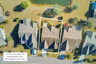 Pond living in this spacious, turn-key home in Del Webb Cane Bay