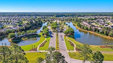 Pond living in this spacious, turn-key home in Del Webb Cane Bay