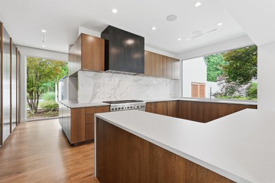 An extraordinary one-level estate in the prestigious gated - photo 21