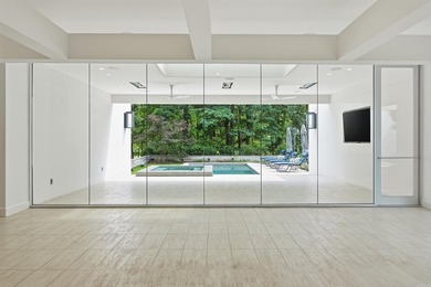 An extraordinary one-level estate in the prestigious gated - photo 26