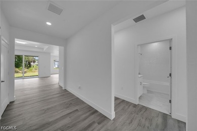 Brand-new construction featuring 3 bedrooms, 2 bathrooms, and 1 - photo 5