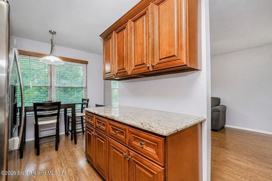 Welcome to this beautiful end-unit townhouse in the heart of - photo 17