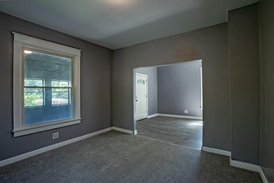 Adorable home with covered front porch. Large entry foyer for - photo 10