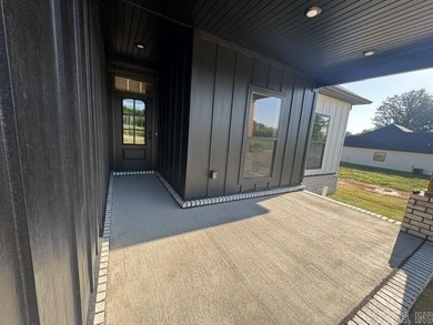 Step into modern elegance with this brand-new 4-bedroom - photo 2