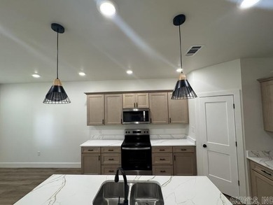 Step into modern elegance with this brand-new 4-bedroom - photo 4