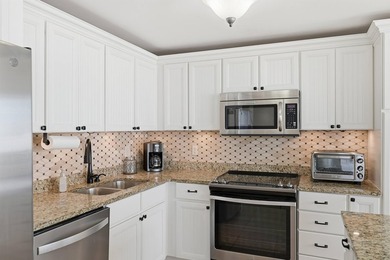Welcome to Edgewater 212, a beautifully renovated and highly - photo 15
