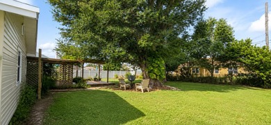 This well-maintained 3-bedroom, 2-bath home offers a bright - photo 23