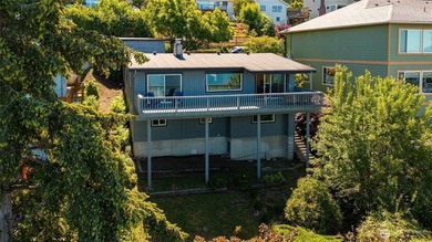 Perched on a quiet South Hill lane, this timeless Mid-Century - photo 26