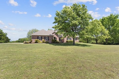 Nestled along the 13th hole of the prestigious Eagle Creek Golf - photo 4