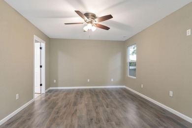Move-in ready 3BR/3BA ranch in Kirbyville, approx. 1,800 SF, all - photo 9