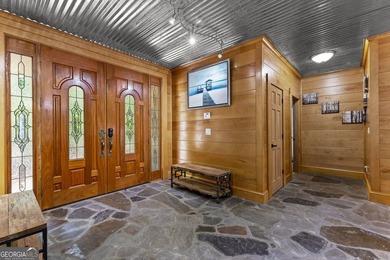 Follow the winding paved driveway through a canopy of mature - photo 19