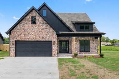 Welcome to this charming cottage-style new construction in the - photo 1