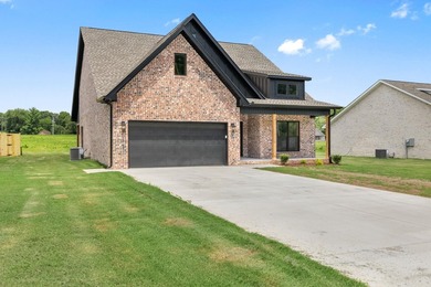 Welcome to this charming cottage-style new construction in the - photo 3