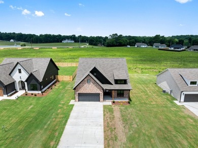 Welcome to this charming cottage-style new construction in the - photo 8