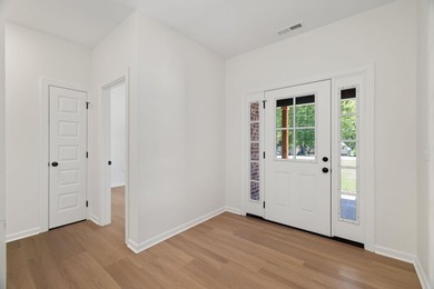 Welcome to this charming cottage-style new construction in the - photo 9