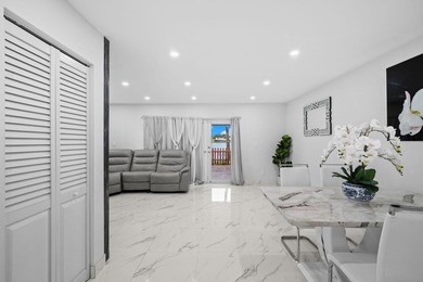 Experience waterfront living in this beautifully updated - photo 11