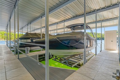 LAKEFRONT! BOAT SLIP! GARAGE! Somebody pinch me! Live the best - photo 3