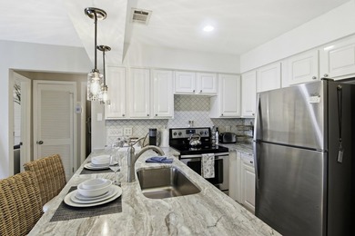 Located on coveted Holiday Isle, this fully furnished - photo 15