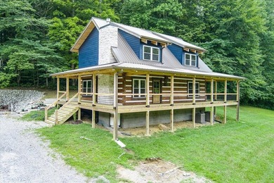 This cabin is a true gem! Offering a new construction log home - photo 2