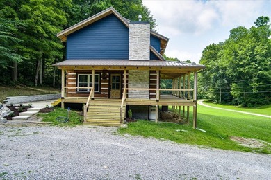 This cabin is a true gem! Offering a new construction log home - photo 6