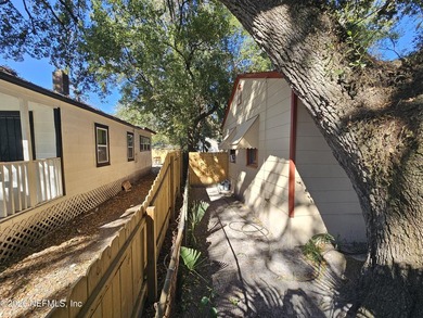 This 1203 square foot single family home has 3 bedrooms and 1.0 - photo 3