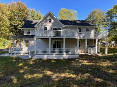 A RARE GEM, WELCOME TO THIS RESTORED VICTORIAN TWO FAMILY HOME