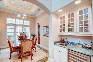 Welcome to this stunning Tuscan-inspired estate featuring an - photo 17