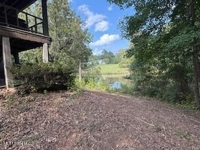 Fixer-Upper with Pond Views on One Acre. Bring your vision and - photo 5
