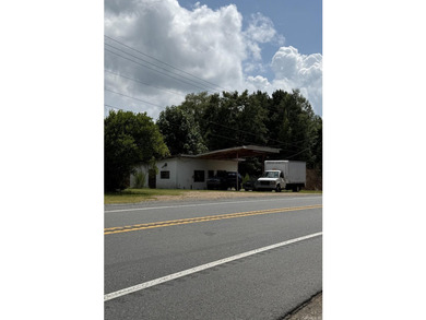 This 2 BR 1.5 Bath fixer upper is a nice 2 acre rural property - photo 2