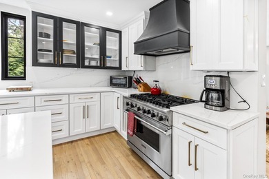 This exquisitely updated home is situated at the end of a - photo 11