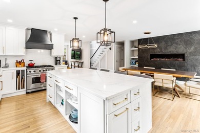 This exquisitely updated home is situated at the end of a - photo 12