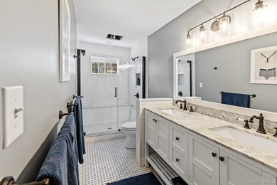 This exquisitely updated home is situated at the end of a - photo 17