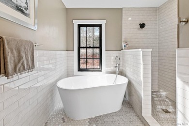 This exquisitely updated home is situated at the end of a - photo 27