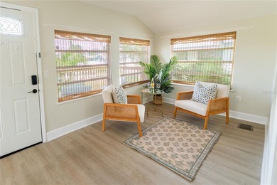 Live the Florida beach lifestyle in this beautifully updated - photo 5