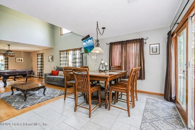 Welcome to this stunning 2-family colonial tucked away on a - photo 12