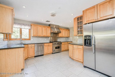 Welcome to this stunning 2-family colonial tucked away on a - photo 14