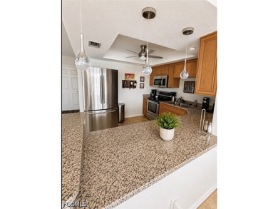 Live the Florida lifestyle in this beautifully maintained - photo 4