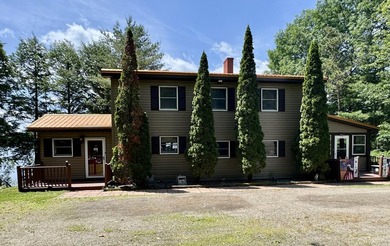 Enjoy lake life in this 3 BR 2 bath waterfront home on pristine - photo 4