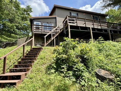 Enjoy lake life in this 3 BR 2 bath waterfront home on pristine - photo 10