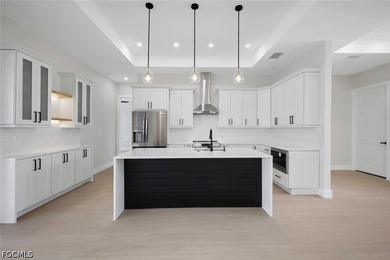 This custom-built 4-bedroom, 3-bathroom home in the desirable - photo 4